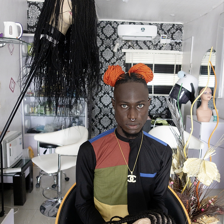 Olawole Israel Falope, who goes by Raymond, at Salon Unique Touch  Image by Stephen Tayo, Jan Hoek